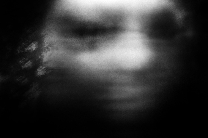 blurred figure