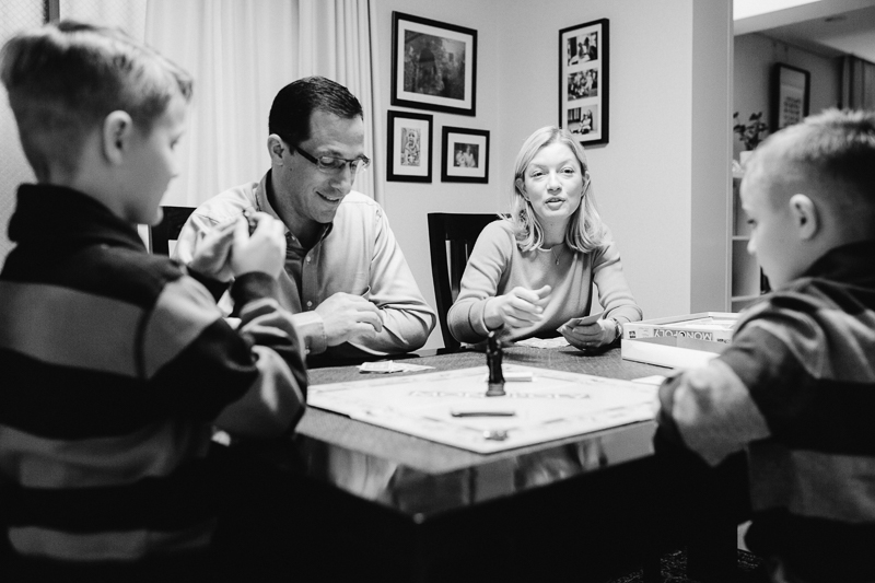 family playing Monopoly