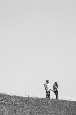 couple holding hands on hill in Tokyo