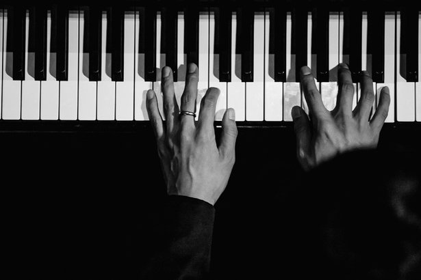 hands on piano keys