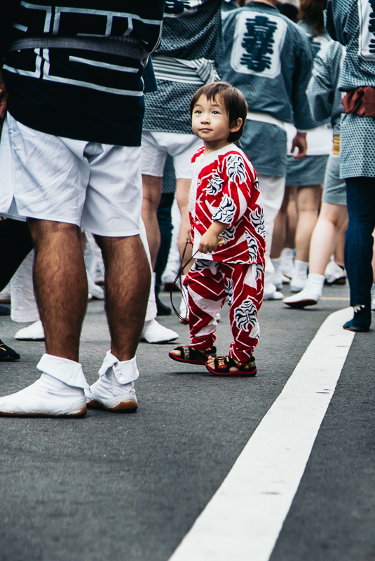 child at the harvest festival in Japan