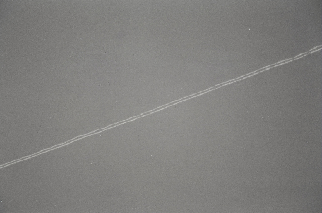 plane exhaust in monochrome
