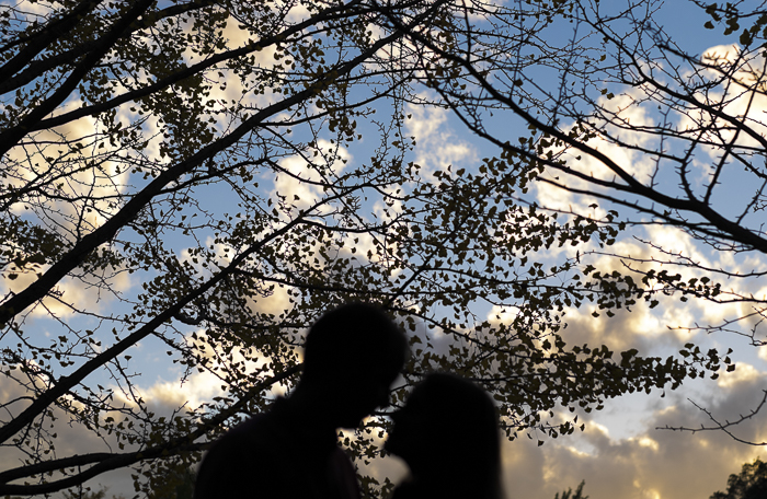 blurred couple in trees 