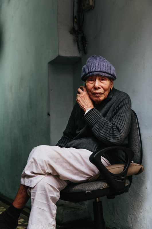 Man sits for a portrait in Vietnam