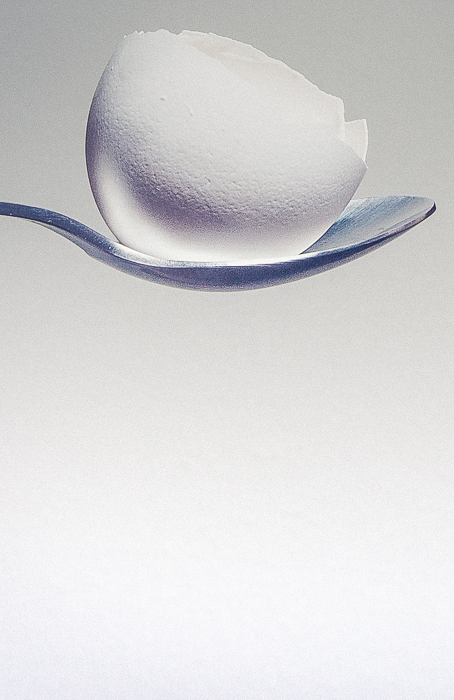 spoon with a cracked egg