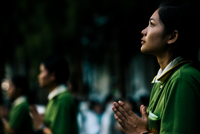 Thai teenager praying