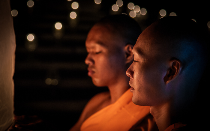 two monks pray
