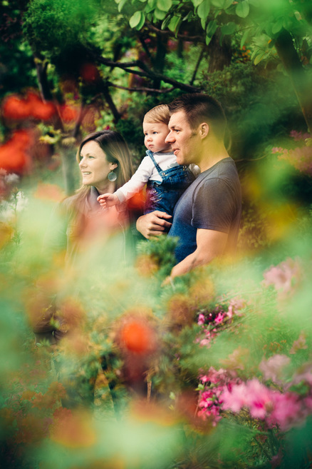 family surrounded by flowers