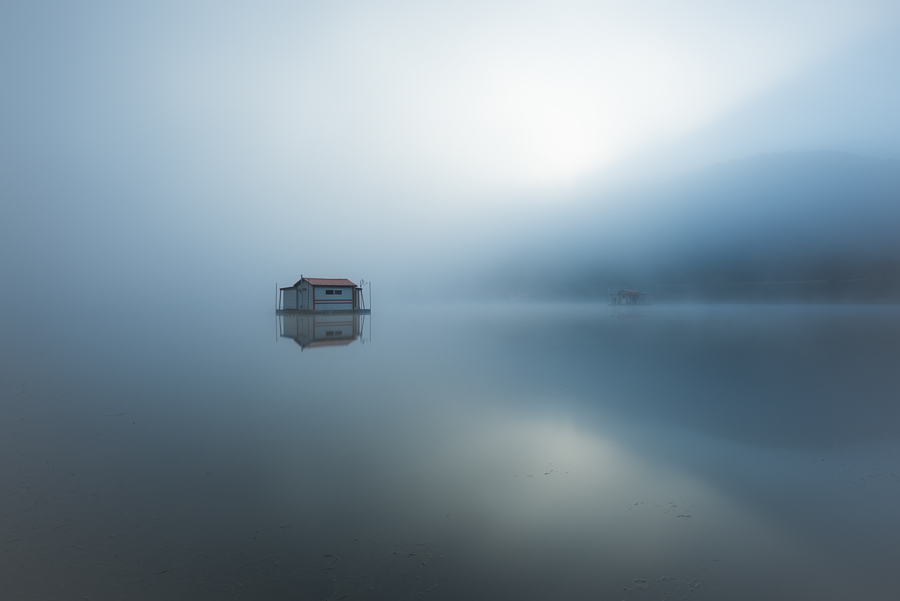 floating structure wrapped in mist