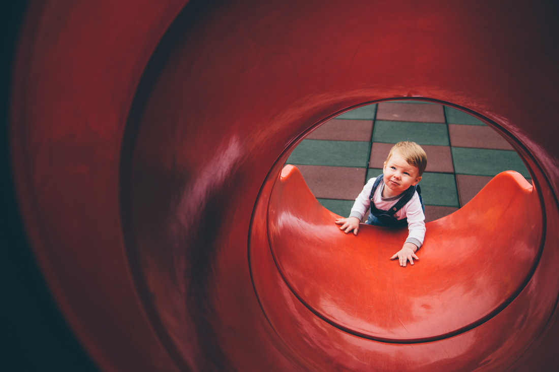 kid looking up slide