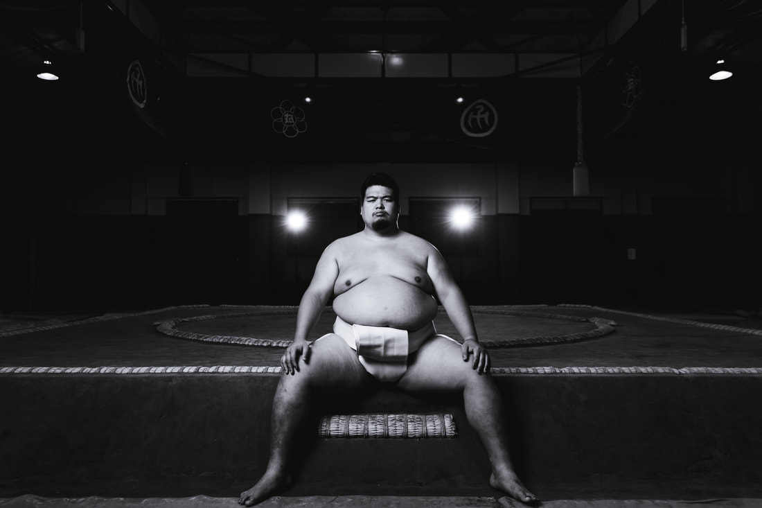 Sumo wrestler sitting