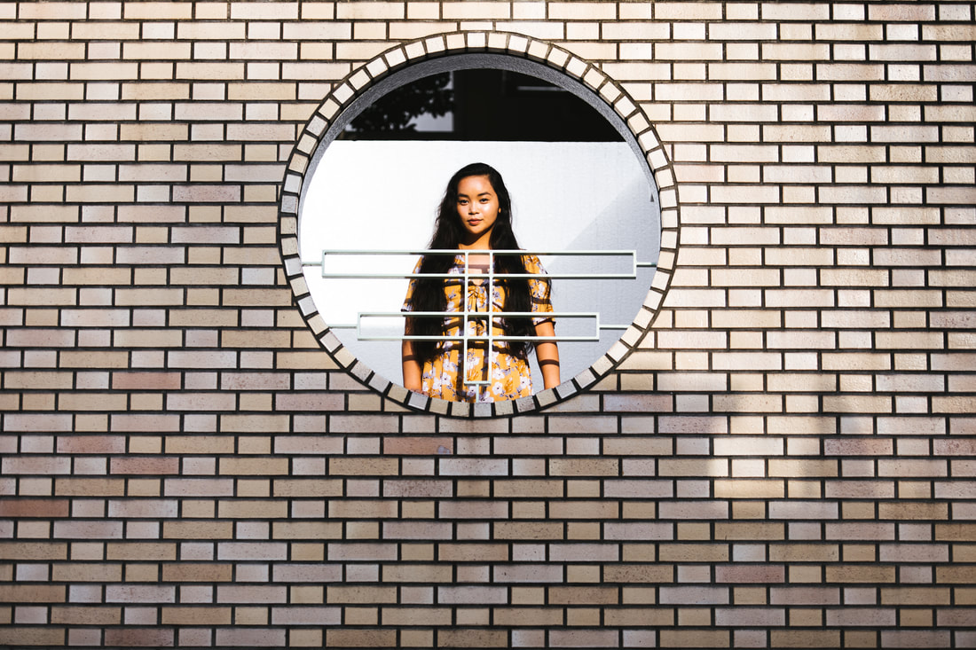 Mia framed by bricks
