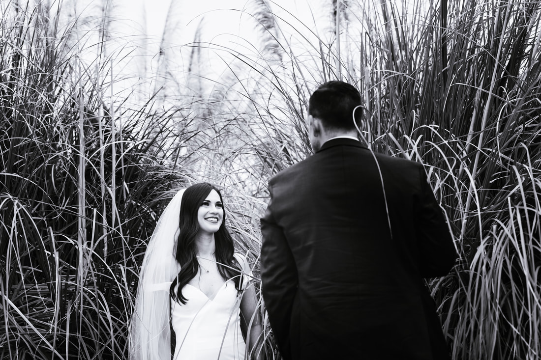 amber and Justin in pampas grass