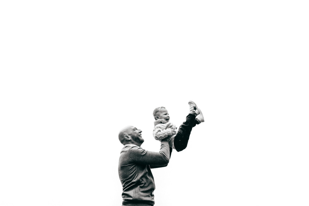 Dad throws son in air