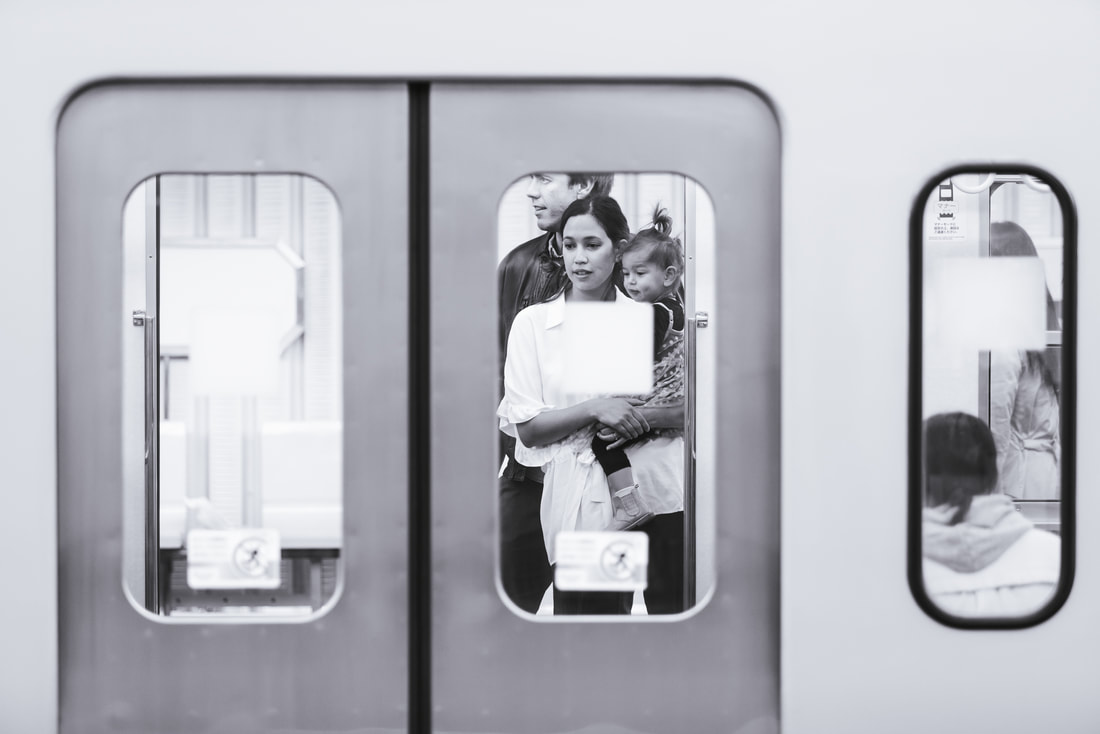 Family through train window