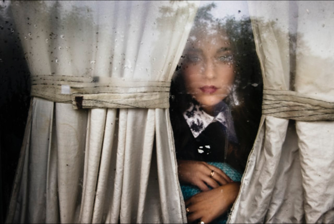 Girl in foggy window