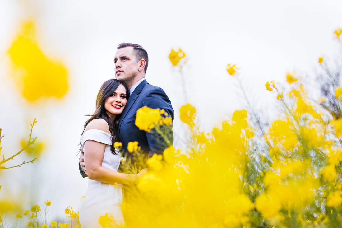Pre-wedding portrait in yellow flowers