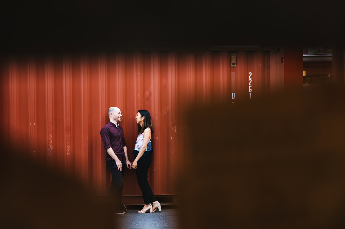 couple with shipping container
