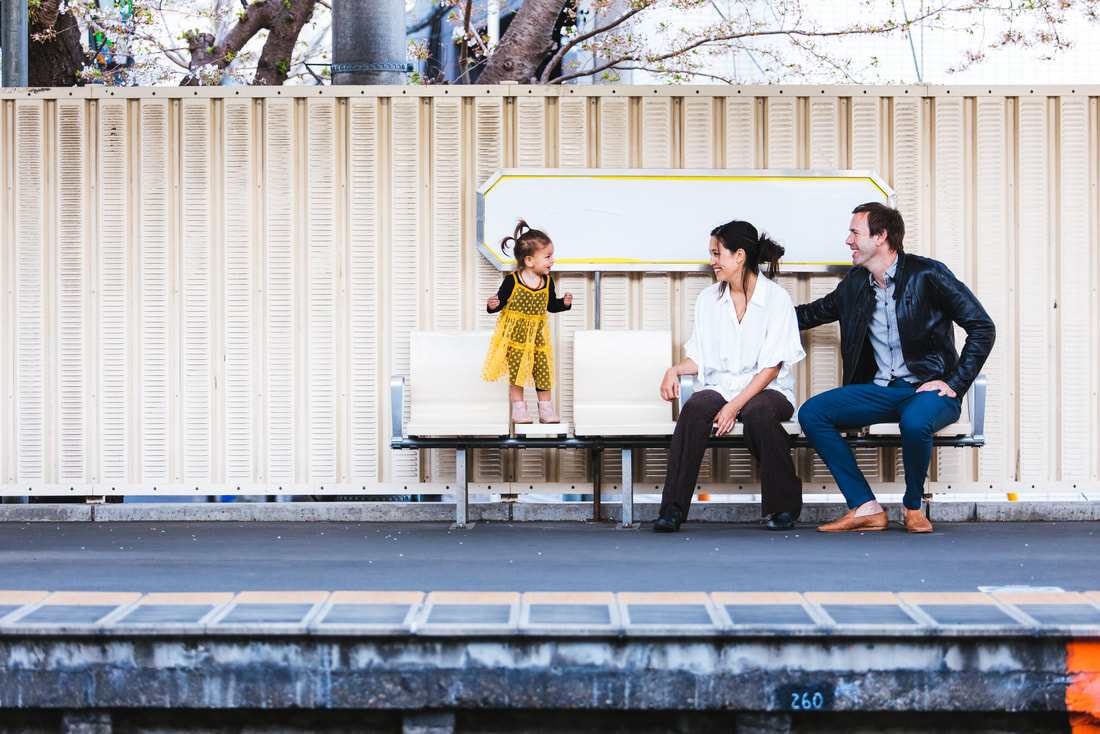family at Tama station platform