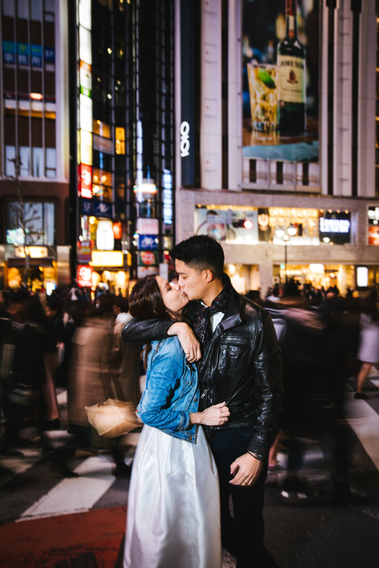 Couple kissing in Shibuya street