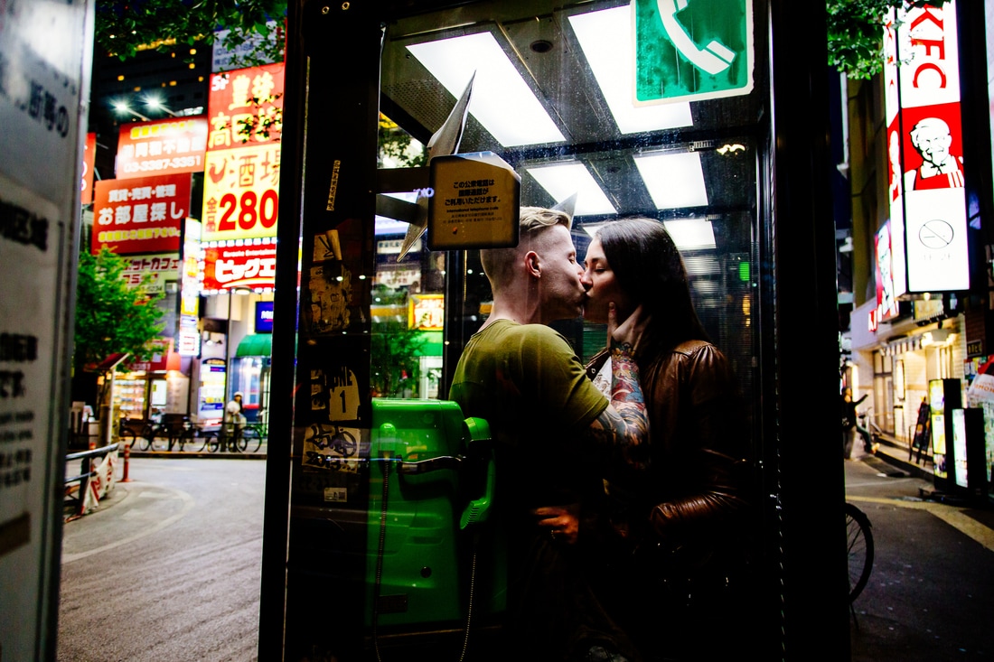 kissing in phone booth
