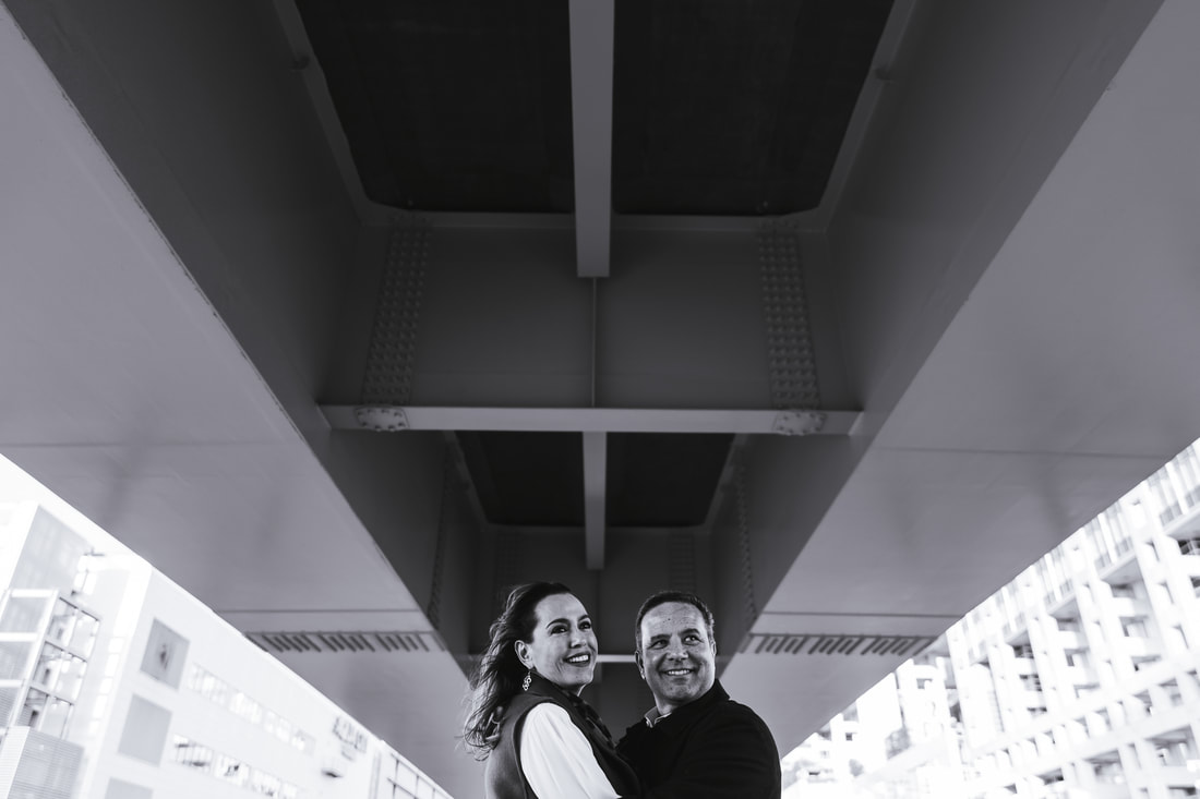 Couple under bridge