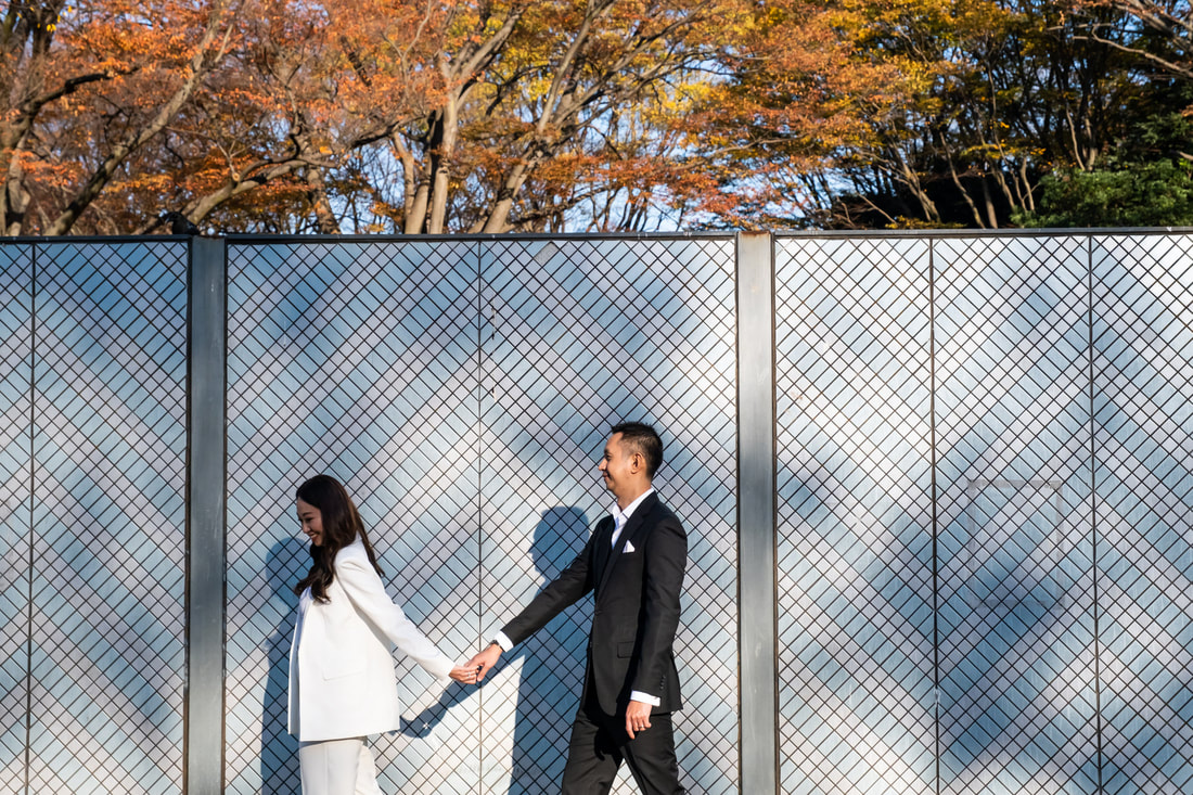 Couple strolls in Ueno park